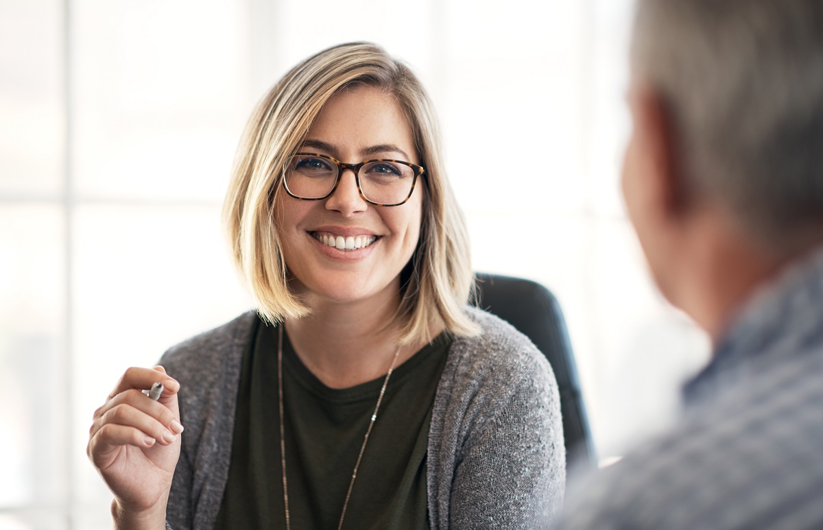 Woman laughing.